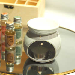 Coffrets en bois d'huiles parfumées comprenant 6 parfums et un brûleur en céramique. My Kozy Shop photo