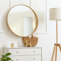 Miroir Wild d'un diamètre de 68 cm et son cadre en bois doré.